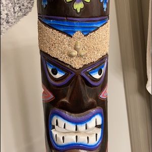 Two tiki masks
